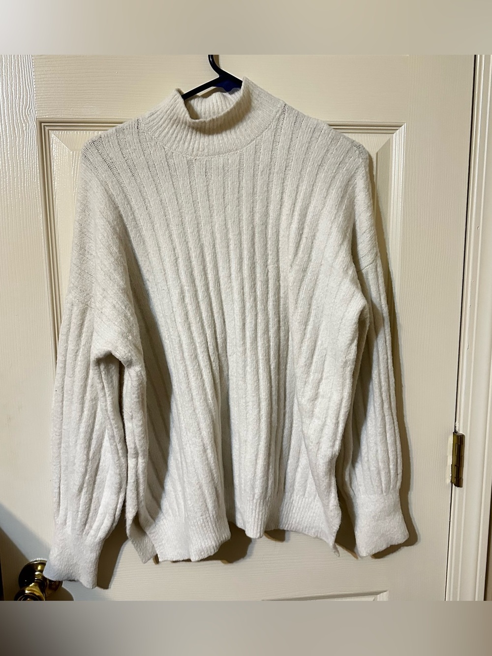Cozy High-Neck Ribbed Sweater in Cream